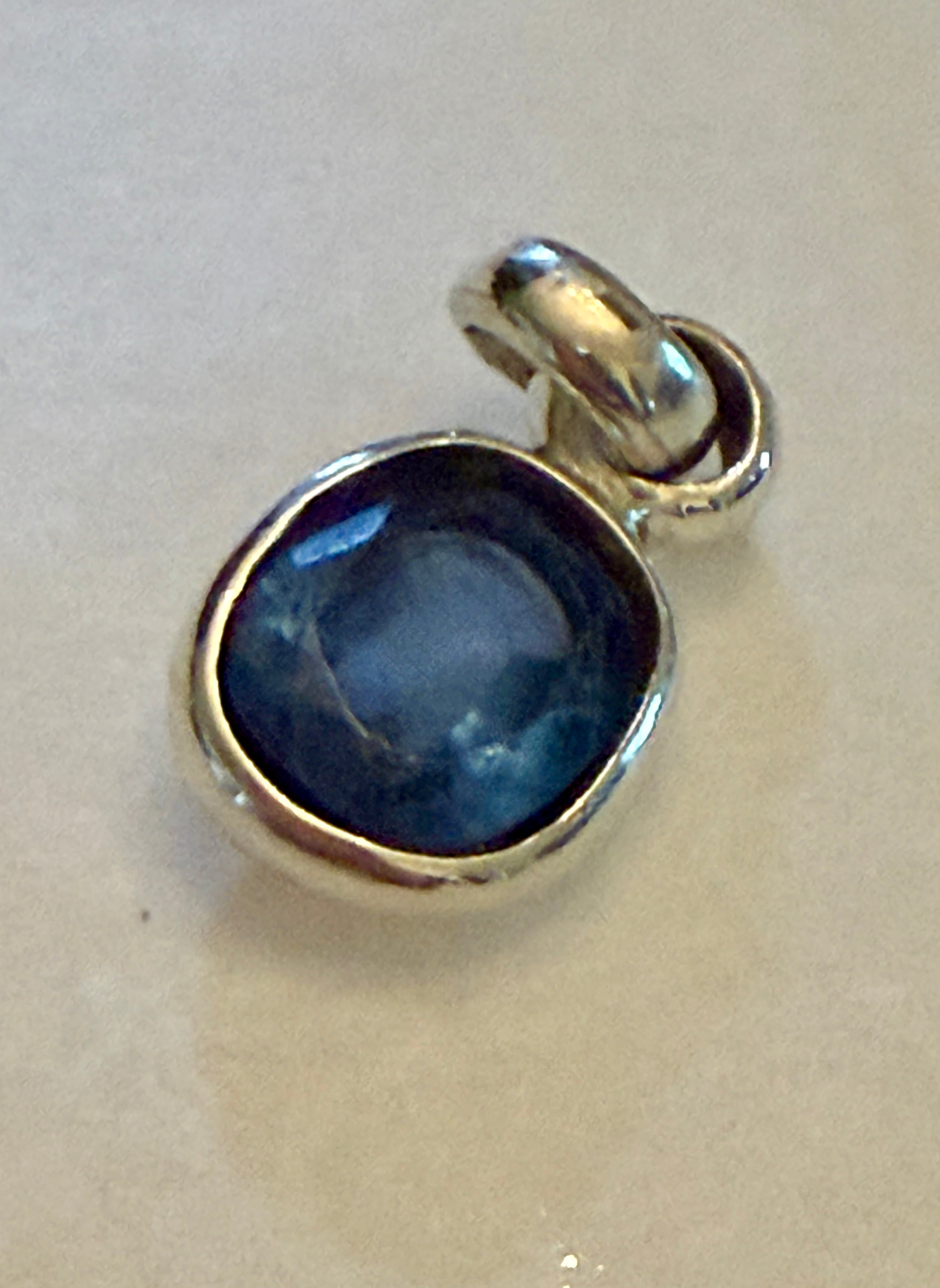 Certified 7.65 carat Blue Sapphire Pendant. Sterling Silver.