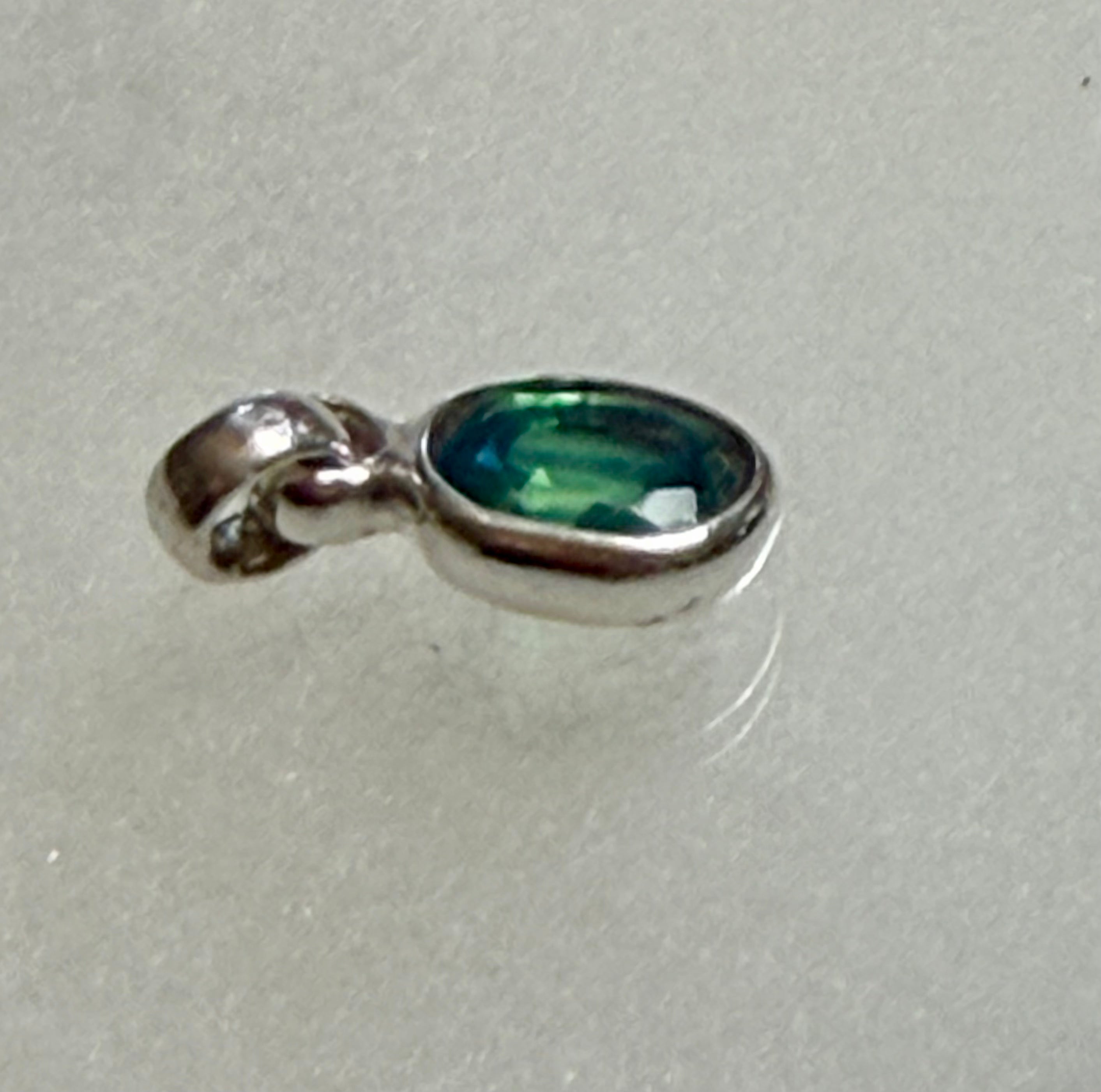 4.95 carat Natural Paraiba Tourmaline Pendant. 925 Sterling Silver.