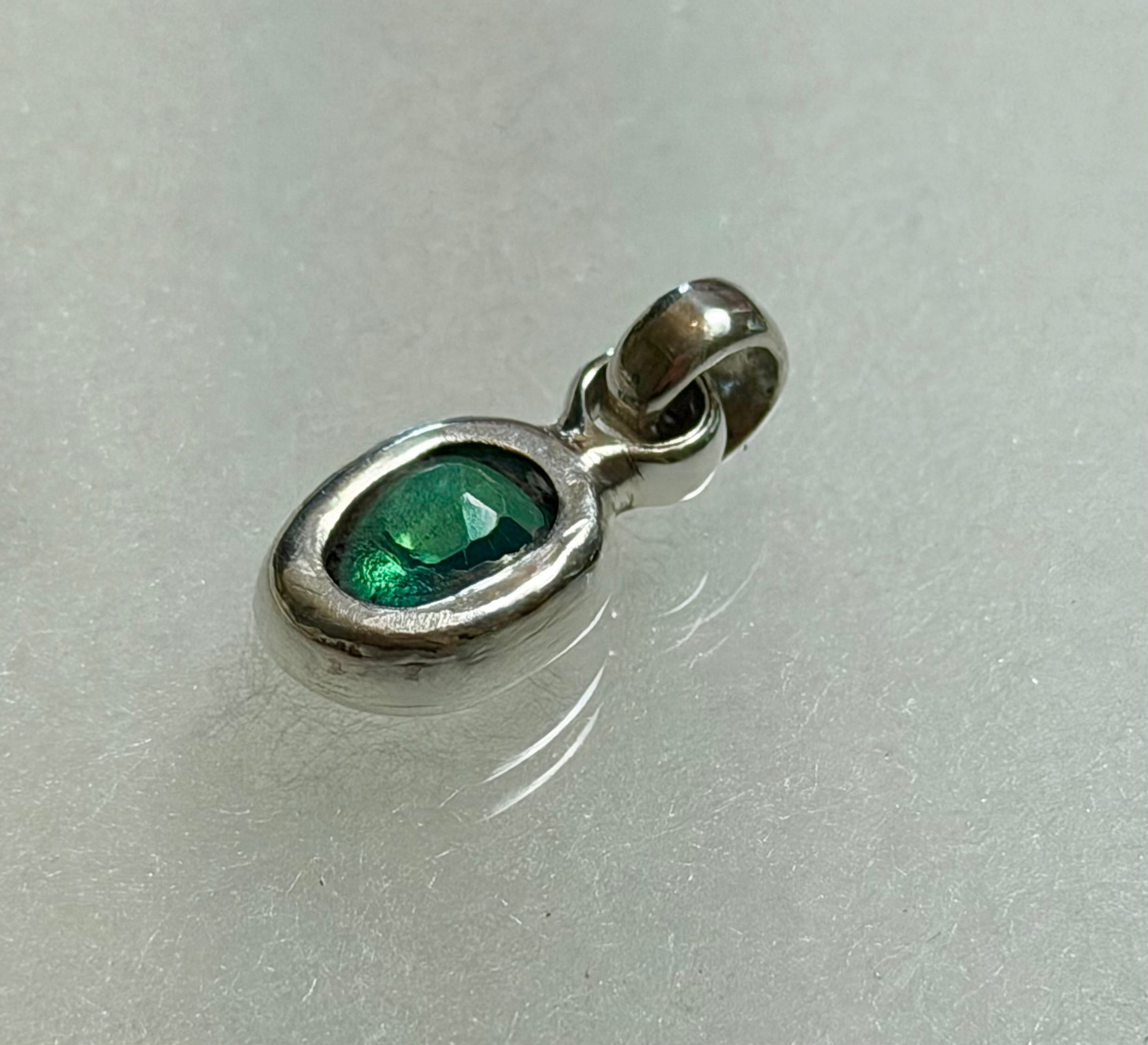 4.95 carat Natural Paraiba Tourmaline Pendant. 925 Sterling Silver.