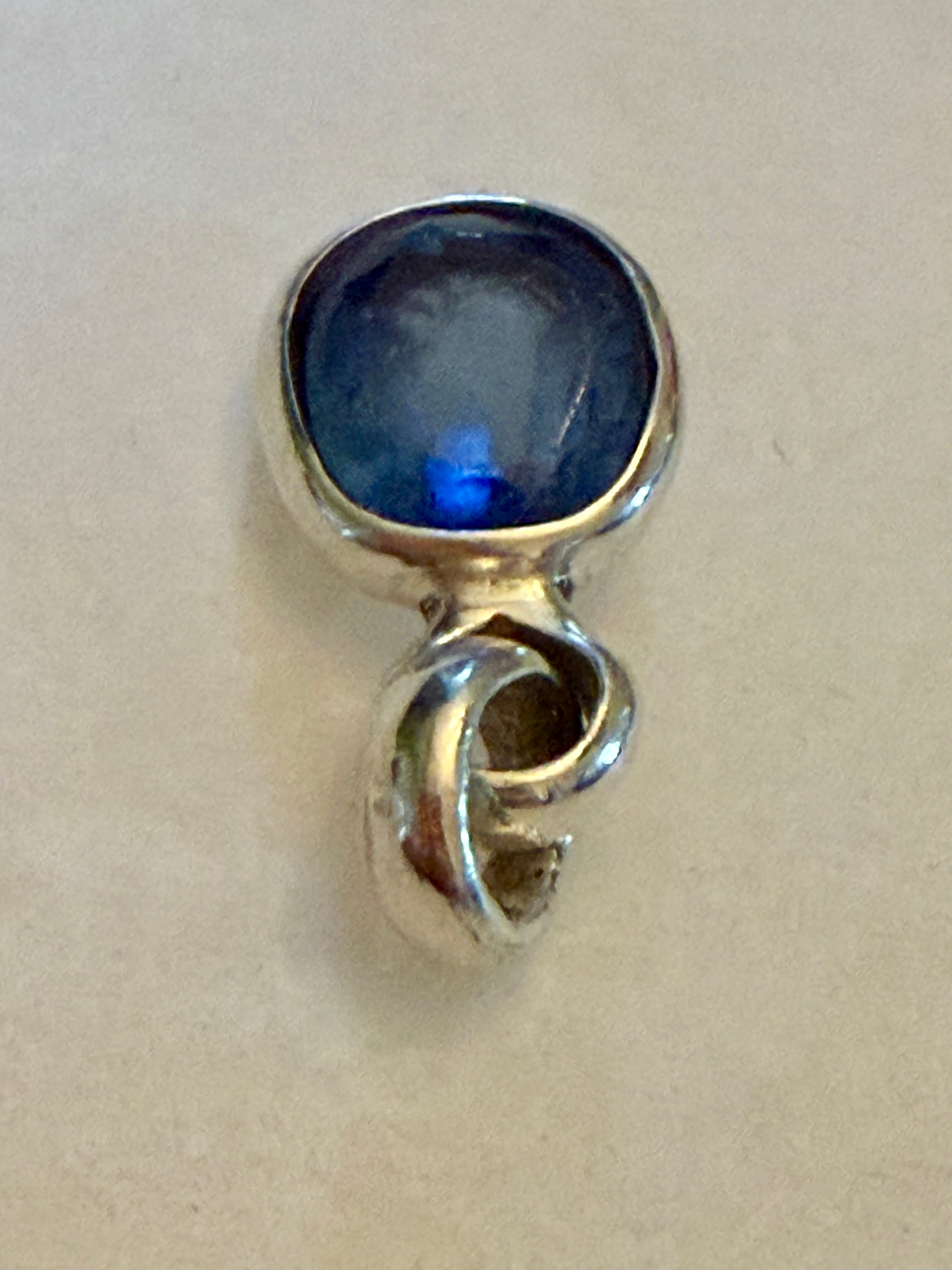 Certified 7.65 carat Blue Sapphire Pendant. Sterling Silver.