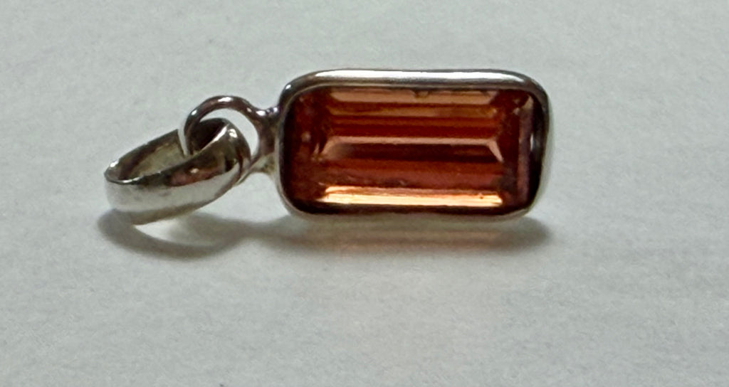 Certified 4.50 Carat Natural Orange Sapphire Pendant. Sterling Silver.