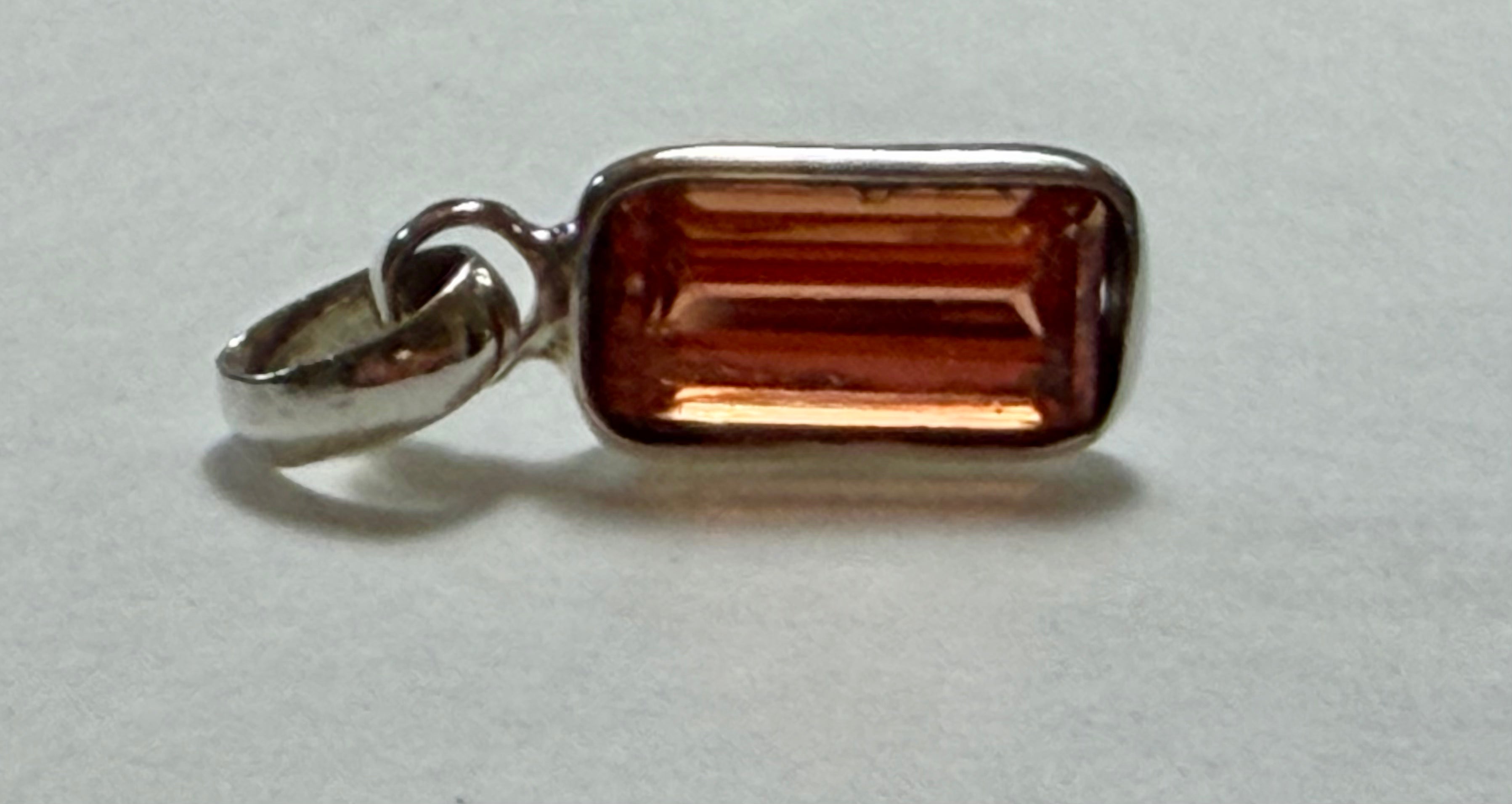 Certified 4.50 Carat Natural Orange Sapphire Pendant. Sterling Silver.