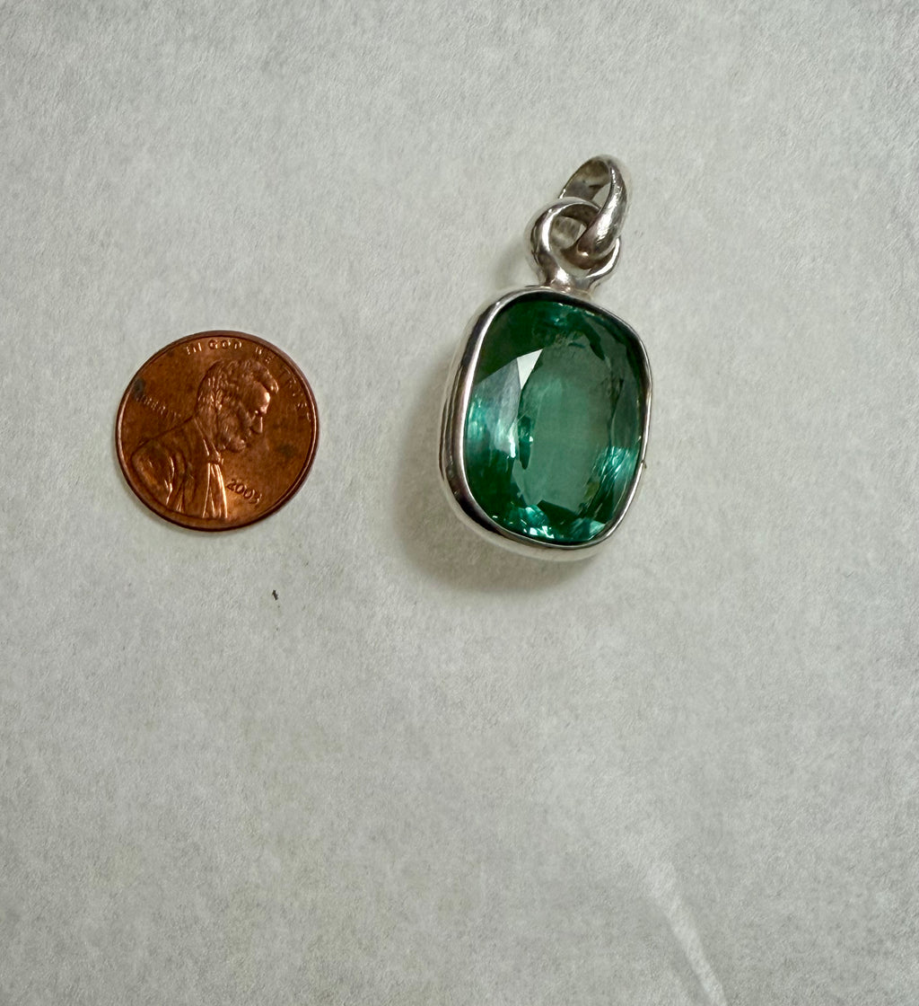 Large 39.50 carat Natural Blue Green Tourmaline Pendant. Sterling Silver.