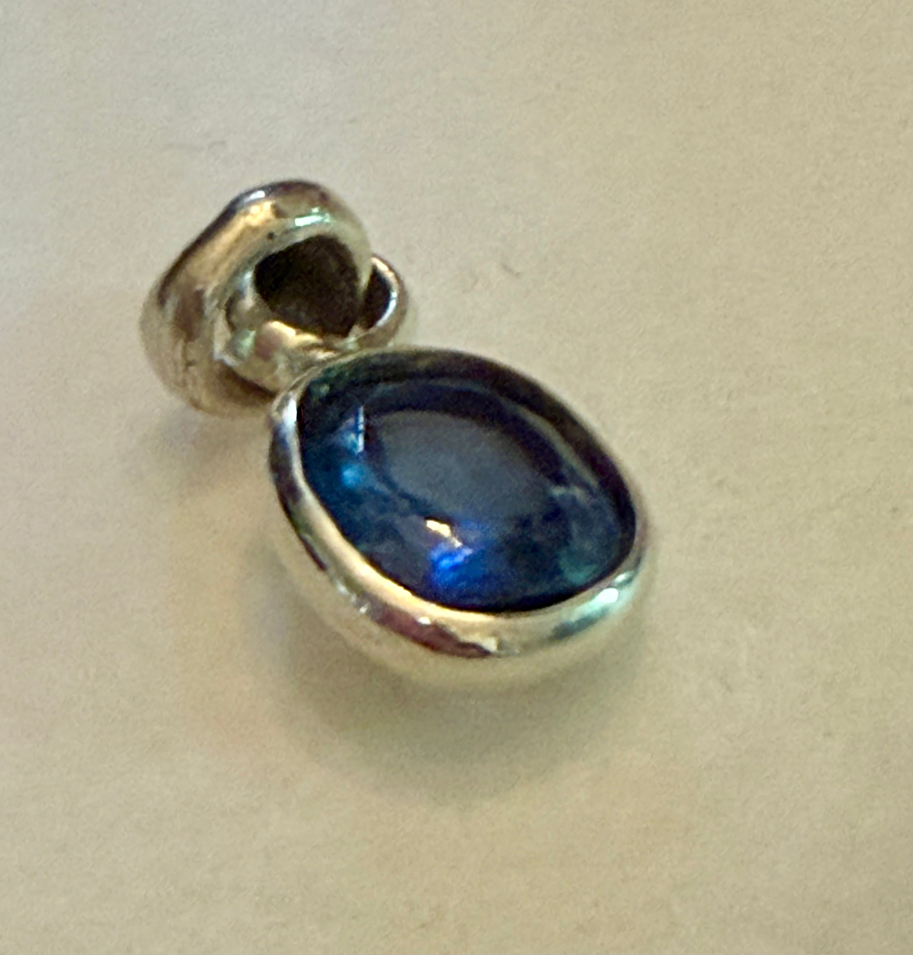 Certified 7.65 carat Blue Sapphire Pendant. Sterling Silver.