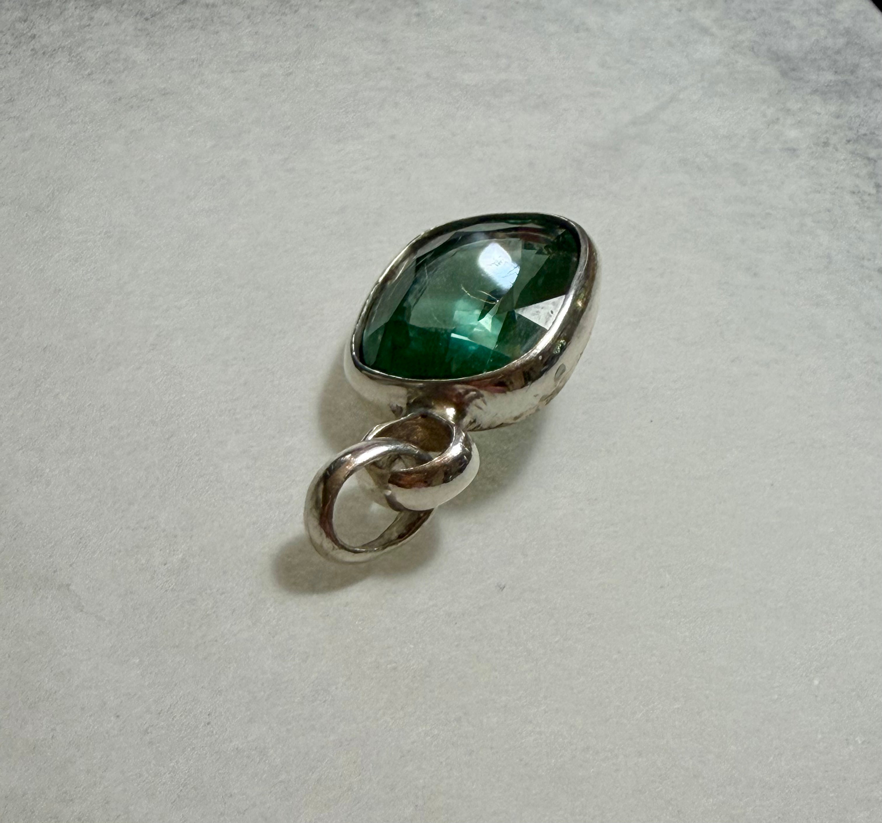 Large 39.50 carat Natural Blue Green Tourmaline Pendant. Sterling Silver.