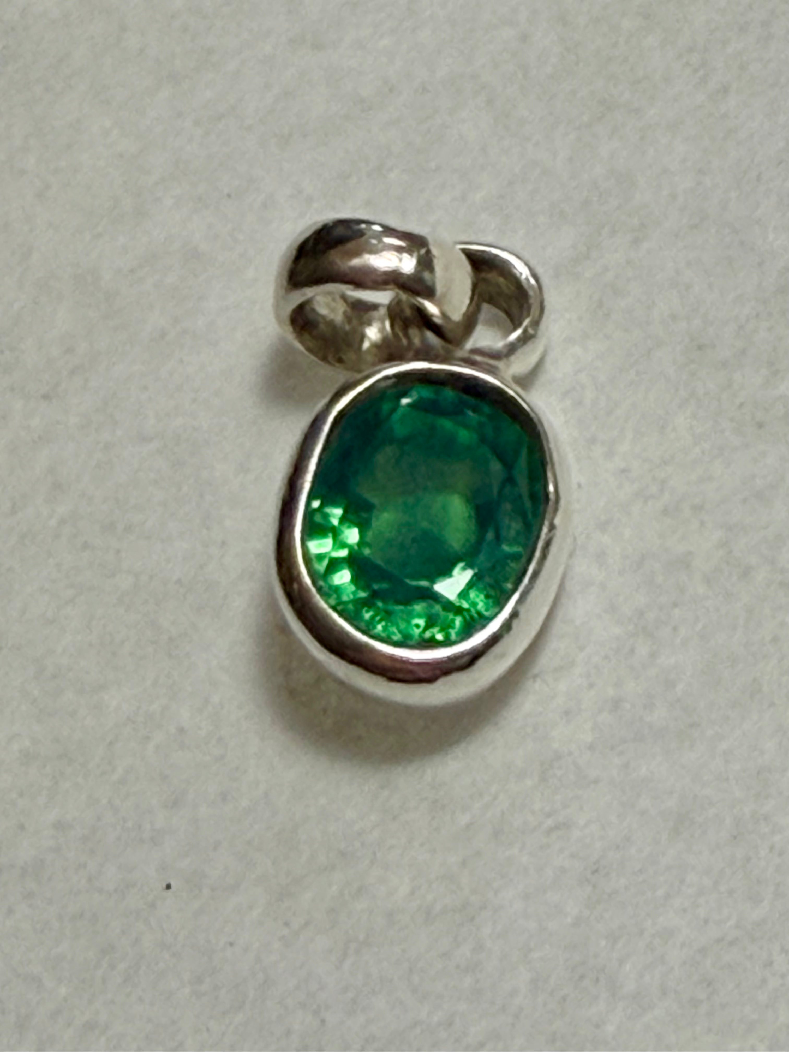 4.95 carat Natural Paraiba Tourmaline Pendant. 925 Sterling Silver.