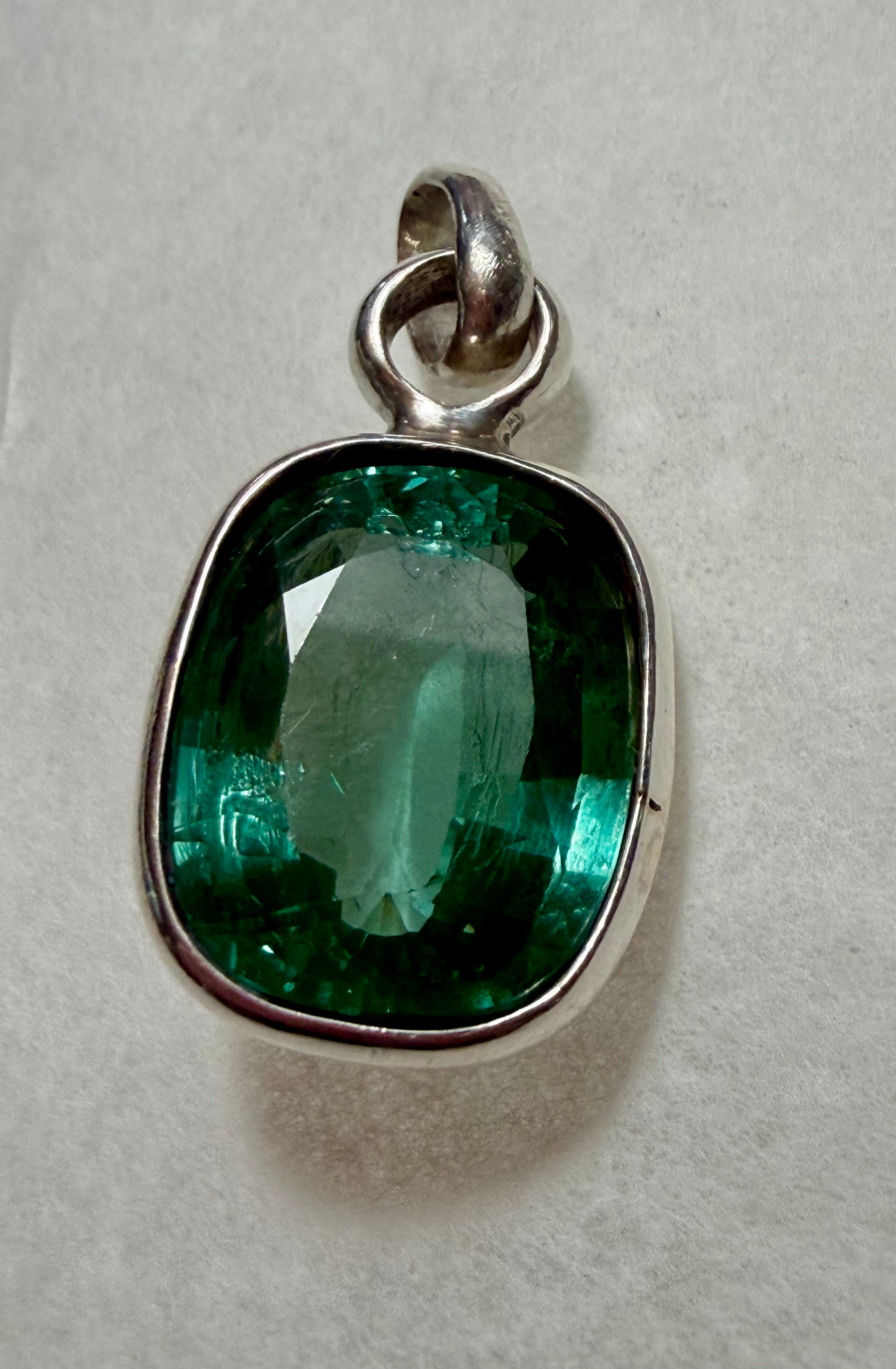 Large 39.50 carat Natural Blue Green Tourmaline Pendant. Sterling Silver.