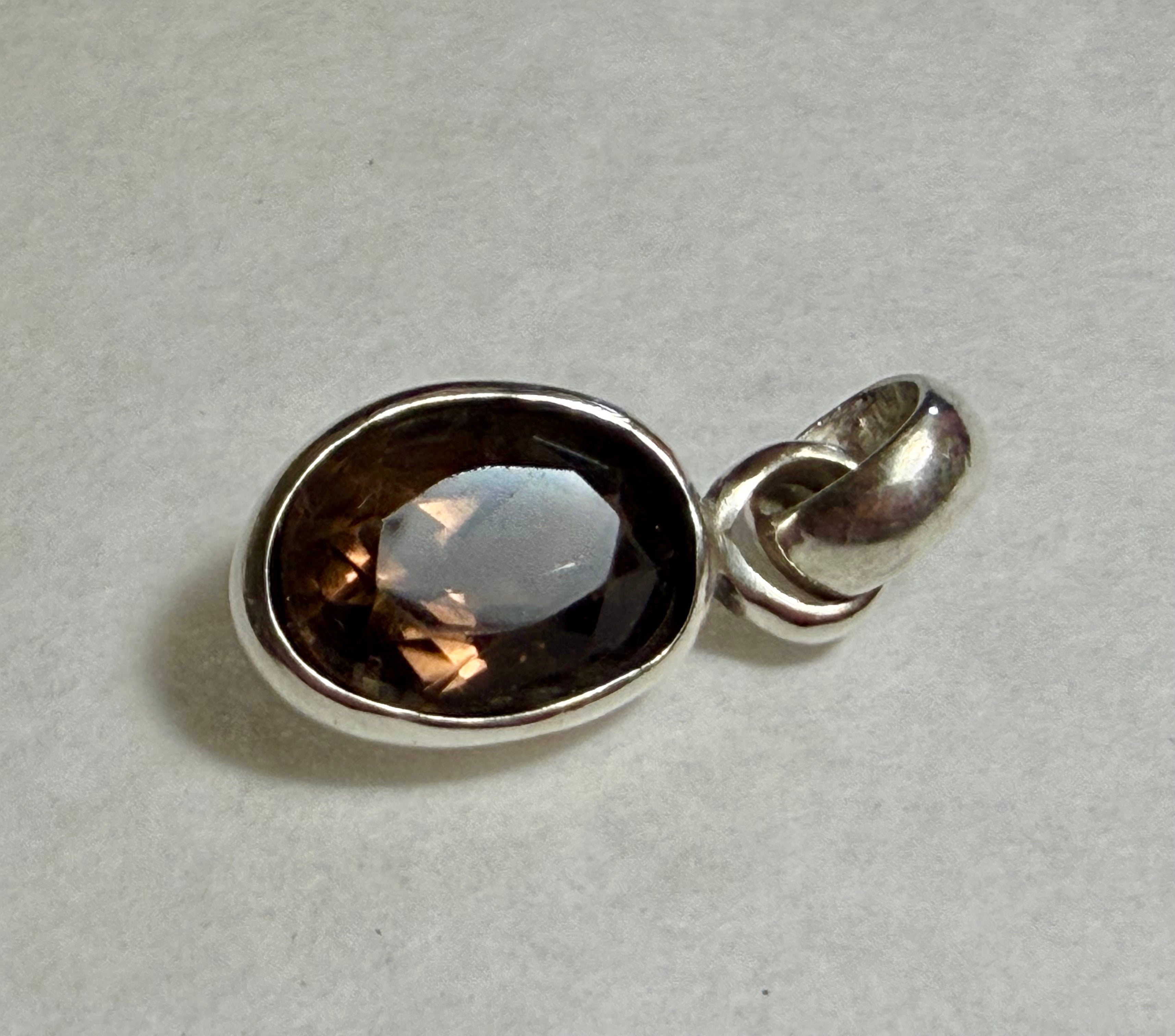 6 carat Smokey Quartz Pendant. 925 Sterling Silver.