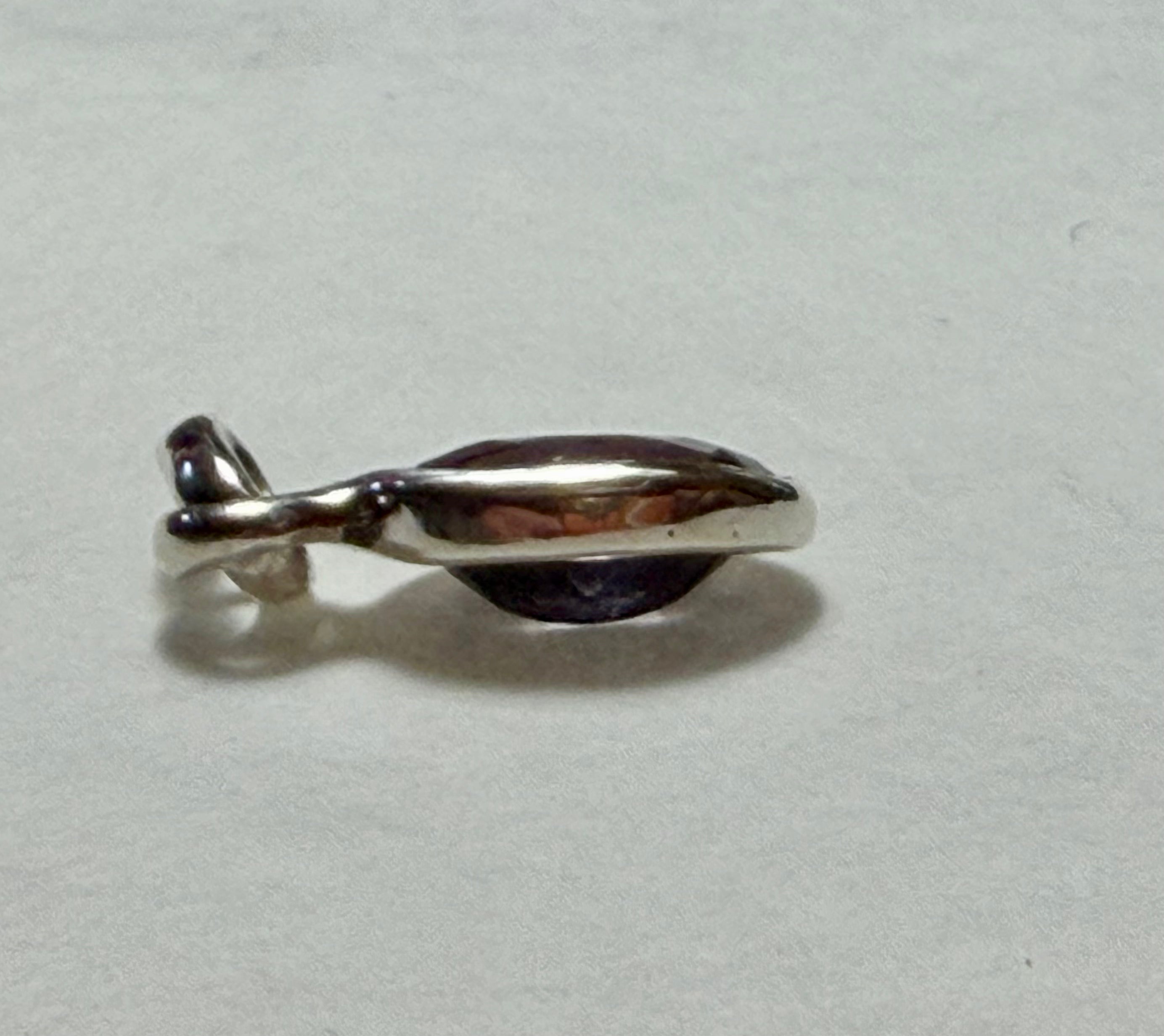 Certified 4.50 carat purple-blue Natural Sapphire Pendant. Sterling Silver.