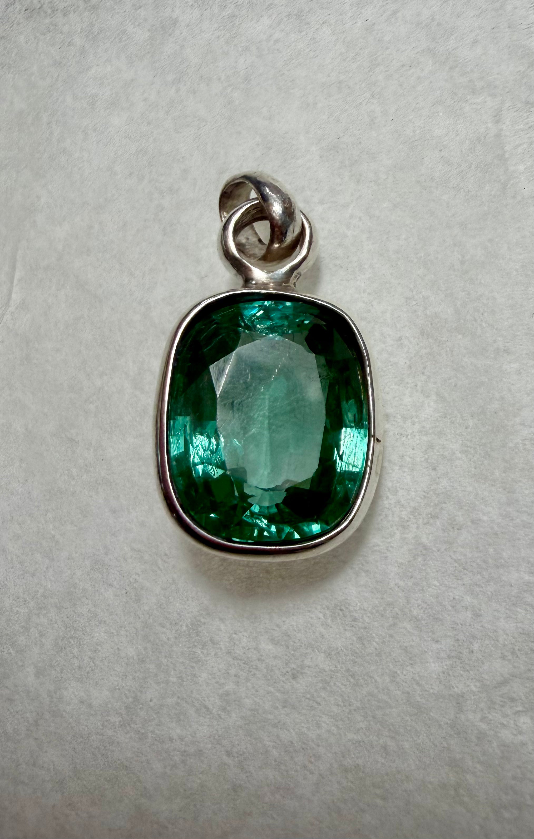Large 39.50 carat Natural Blue Green Tourmaline Pendant. Sterling Silver.