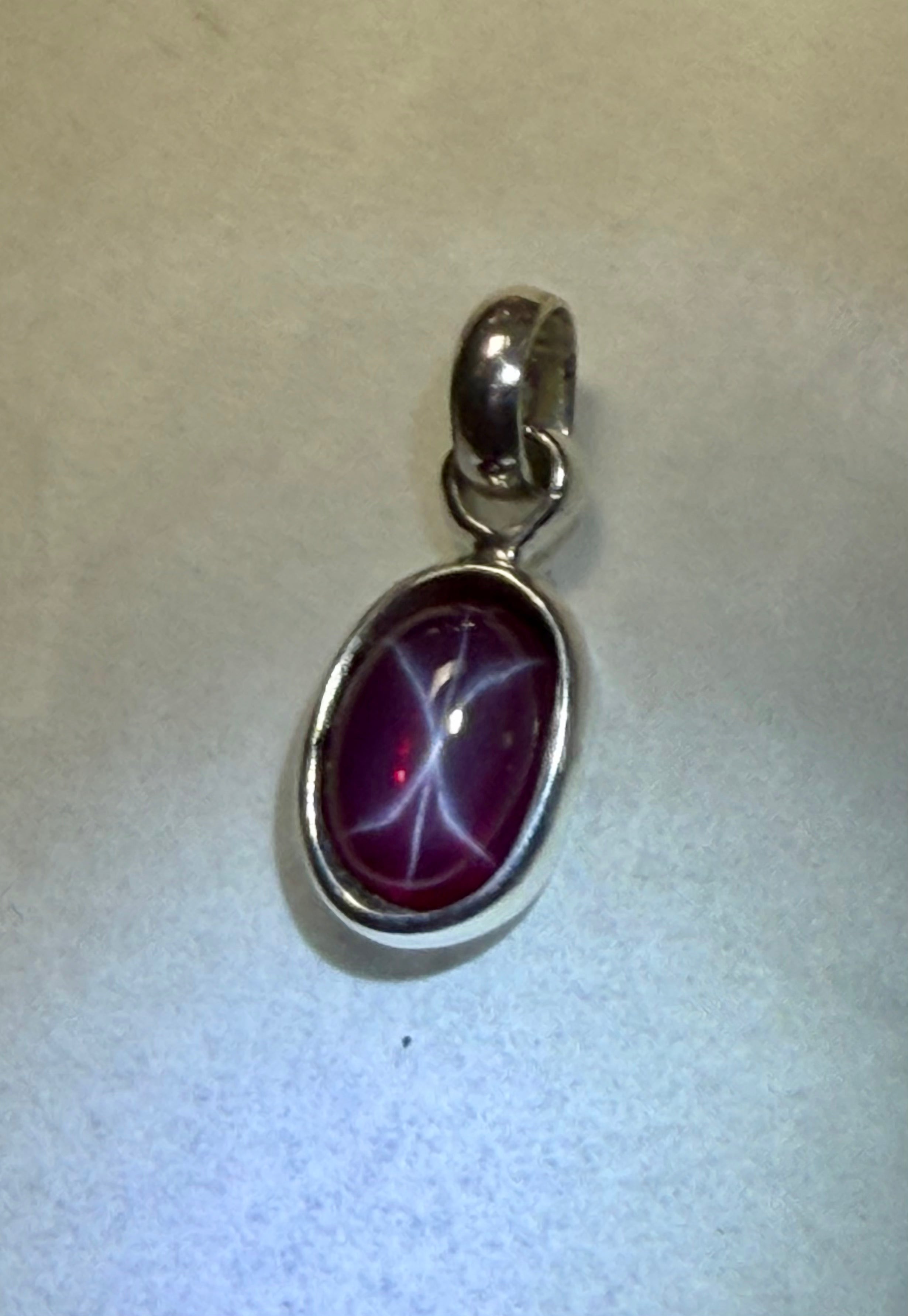 8.50 carat Six Star Ruby Pendant. Sterling Silver