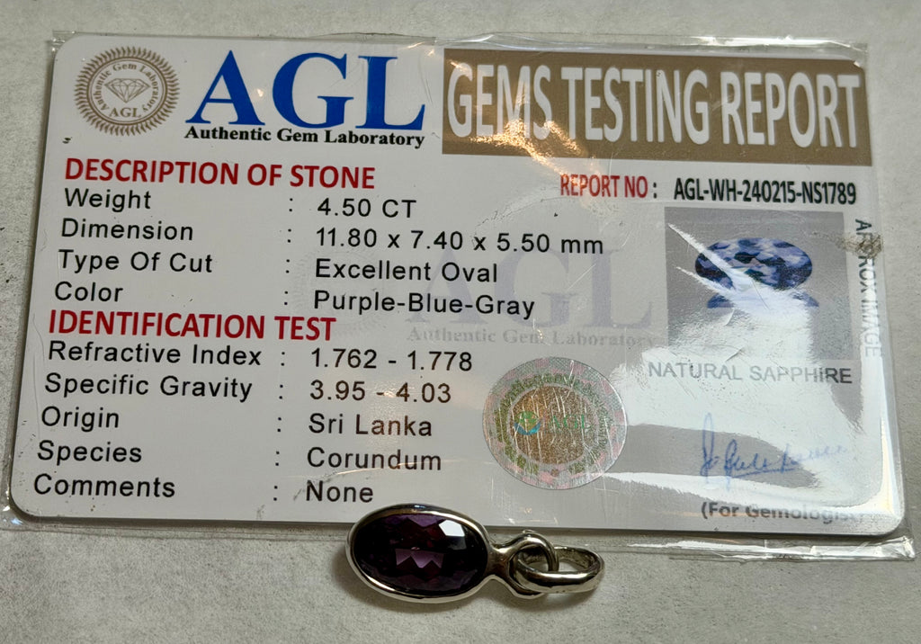 Certified 4.50 carat purple-blue Natural Sapphire Pendant. Sterling Silver.