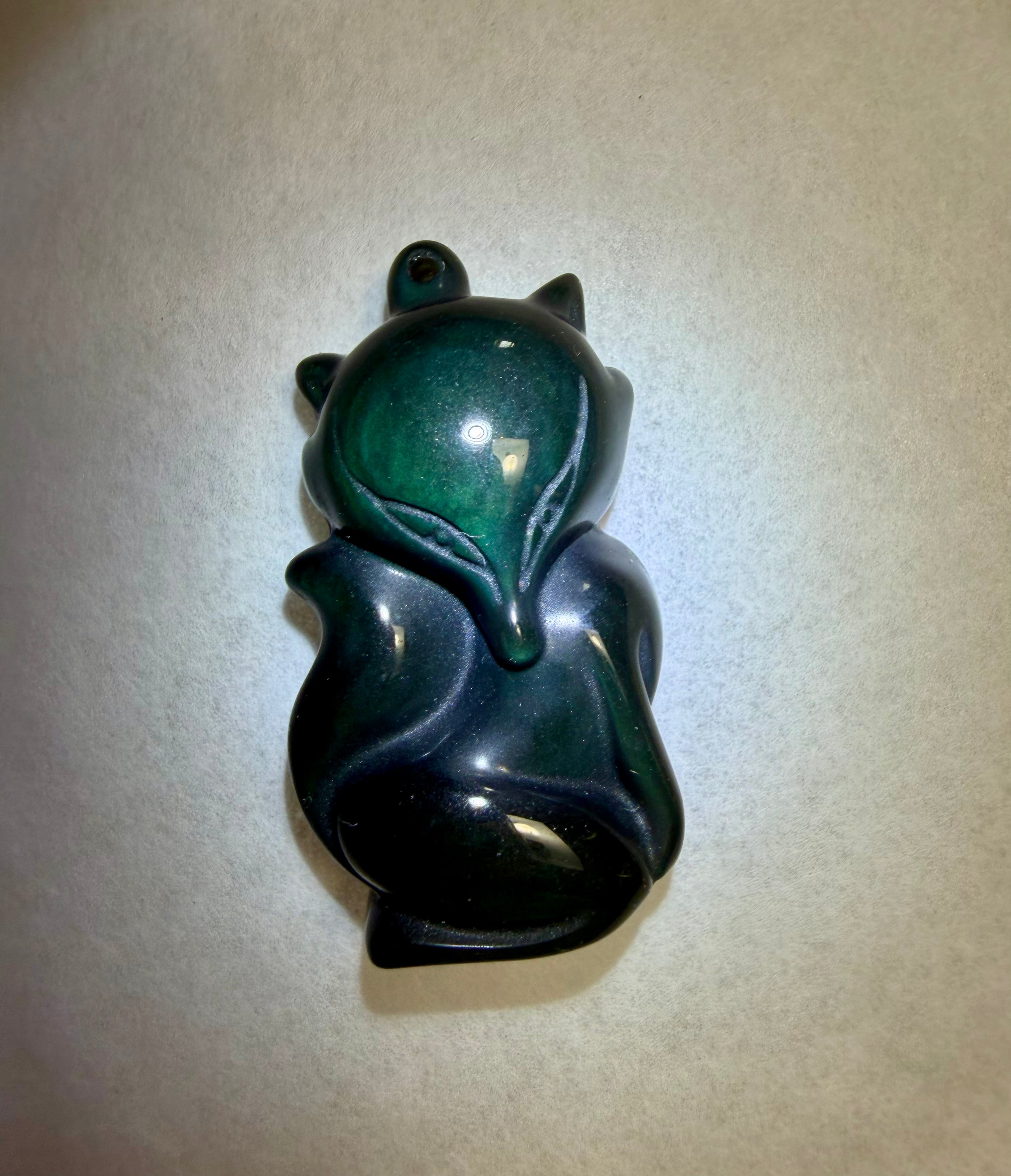 Rare 41.55 carat Green Sheen Obsidian Fox Pendant.