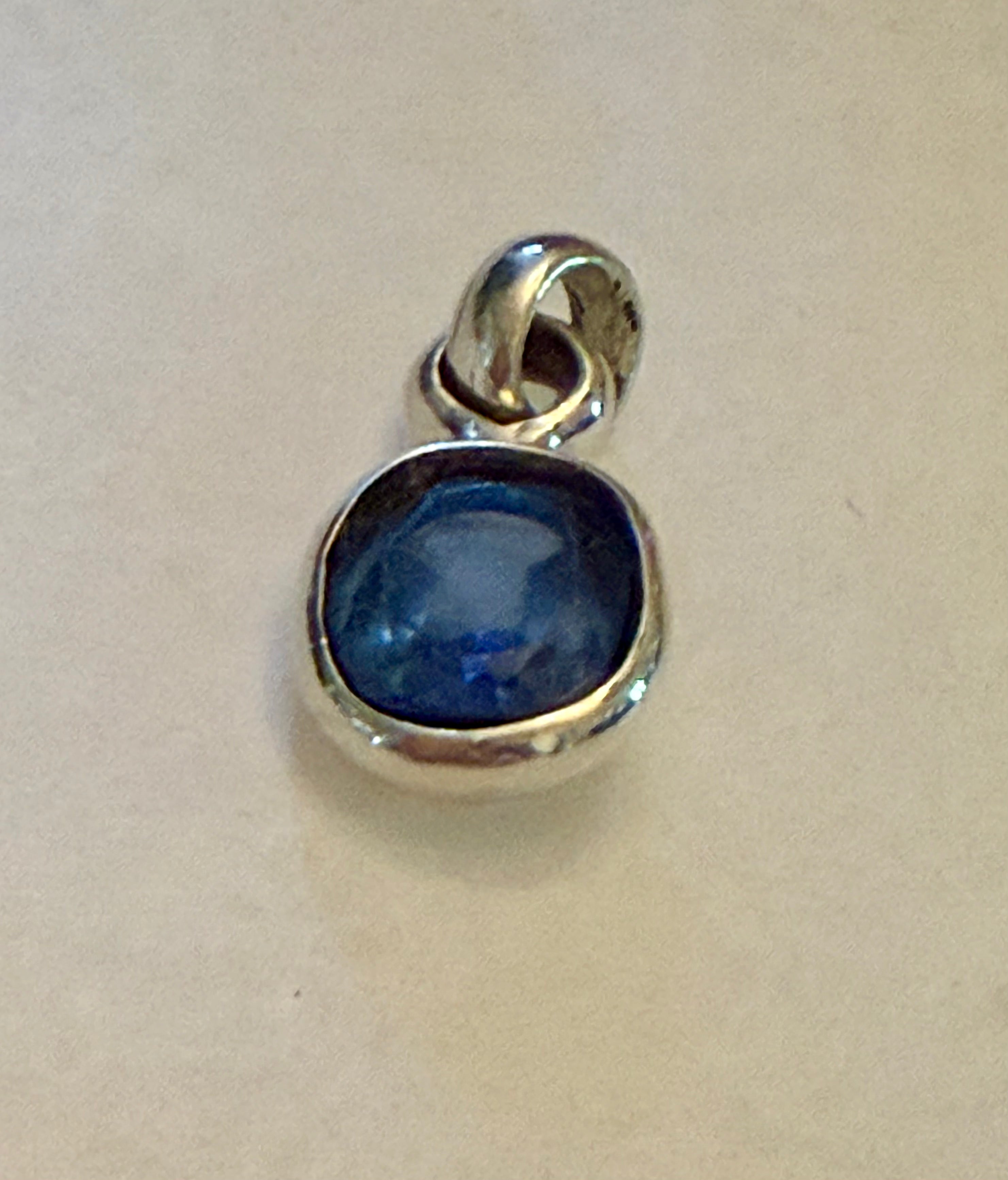 Certified 7.65 carat Blue Sapphire Pendant. Sterling Silver.