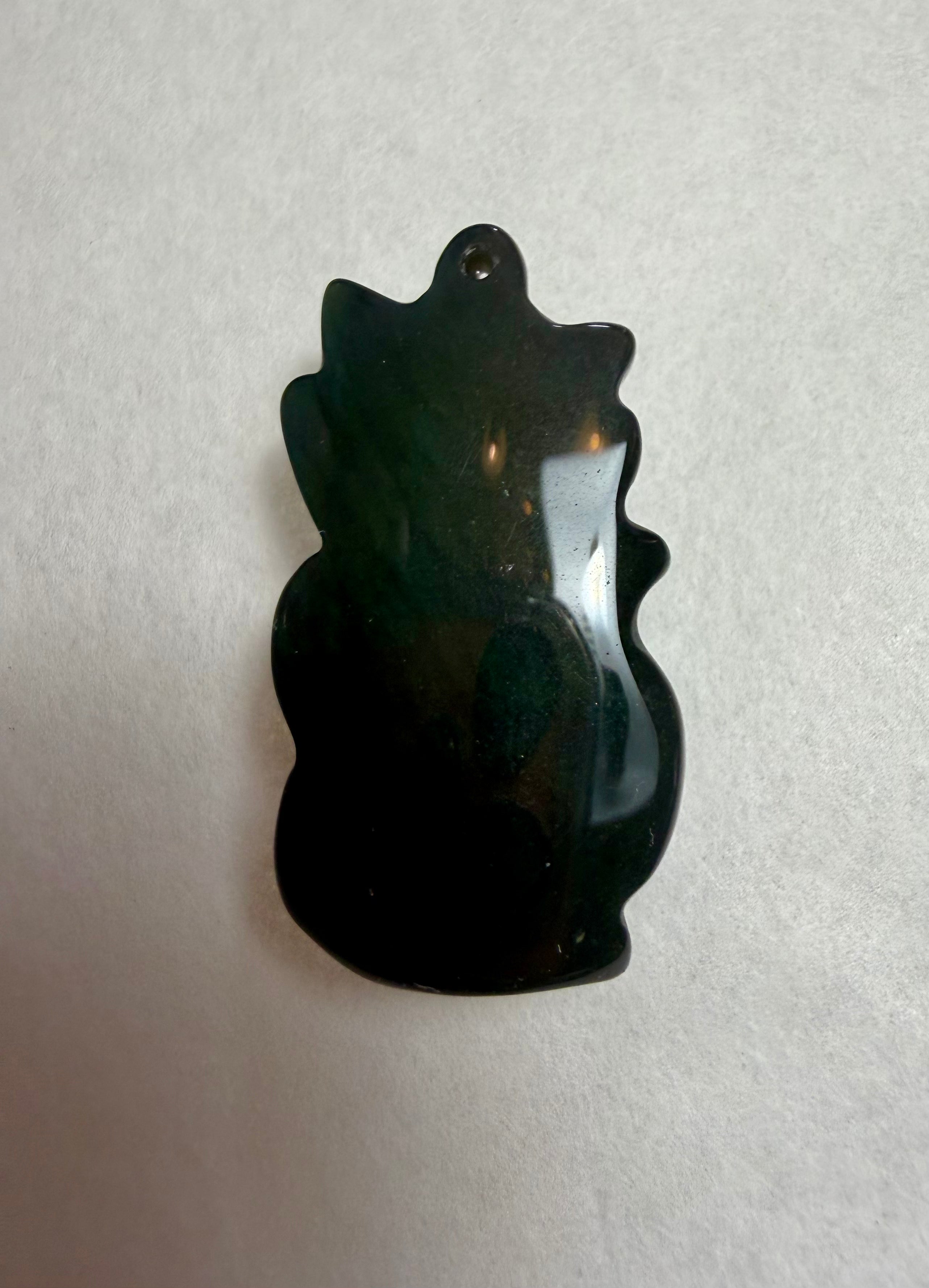 Rare 41.55 carat Green Sheen Obsidian Fox Pendant.