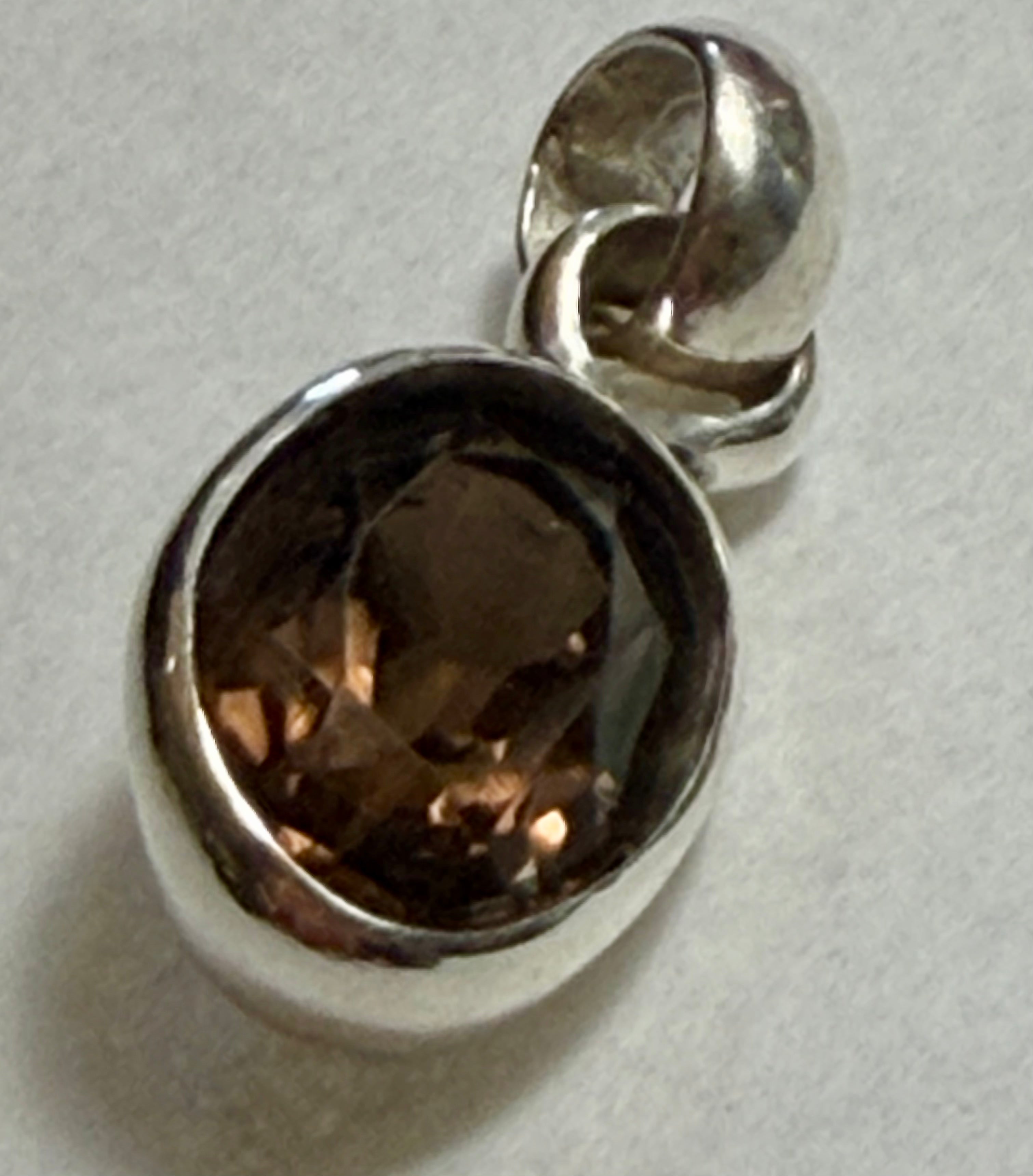 6 carat Smokey Quartz Pendant. 925 Sterling Silver.