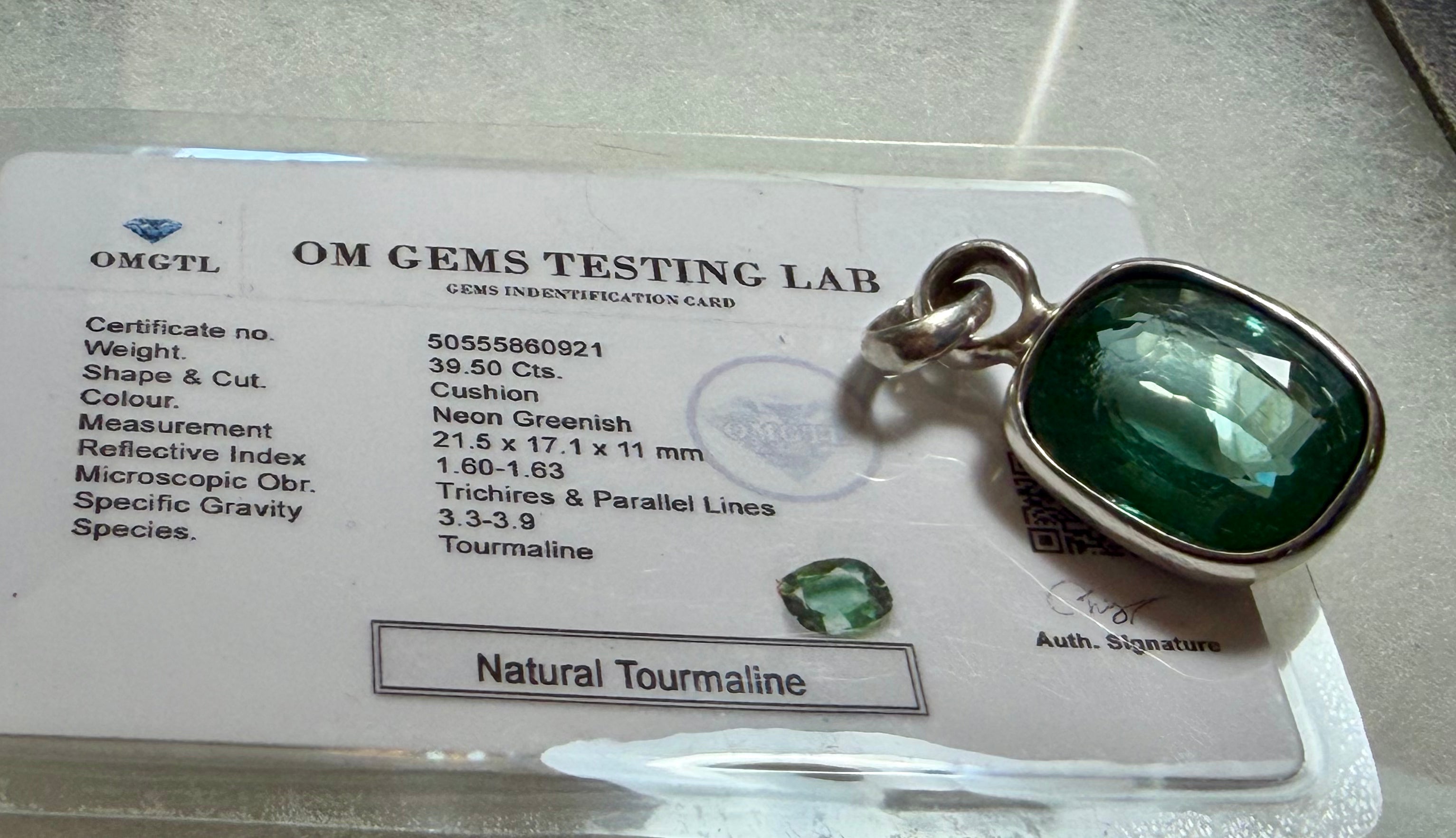 Large 39.50 carat Natural Blue Green Tourmaline Pendant. Sterling Silver.