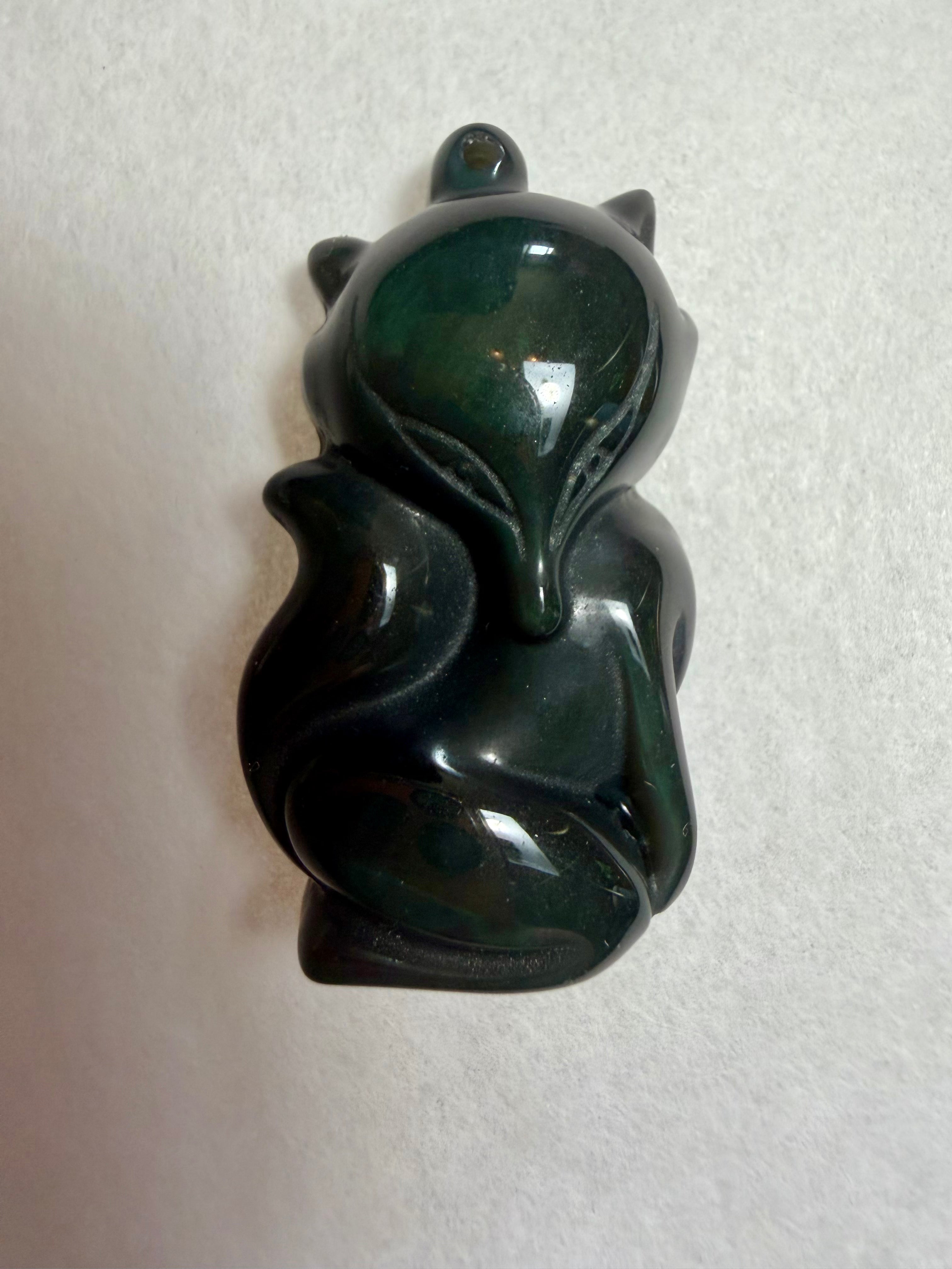 Rare 41.55 carat Green Sheen Obsidian Fox Pendant.